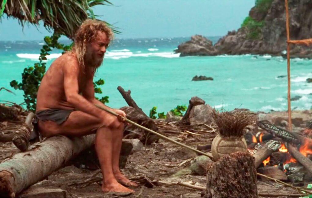 Tom Hanks in Cast Away near a campfire